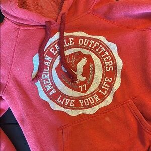 American Eagle Outfitters Red Sweatshirt with Bold Eagle Emblem